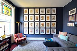 townhouse living room with cool paintings in background